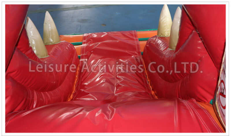 t rex bouncy castle with slide