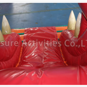 t rex bouncy castle with slide